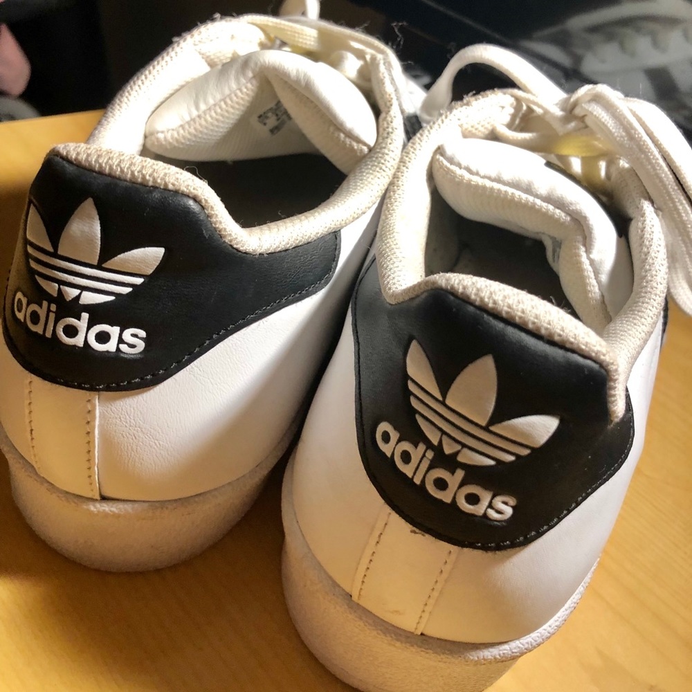 White and black superstar Adidas